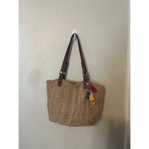 The Sak Collection Crochet woven Tan Bucket Bag with gold outer lining